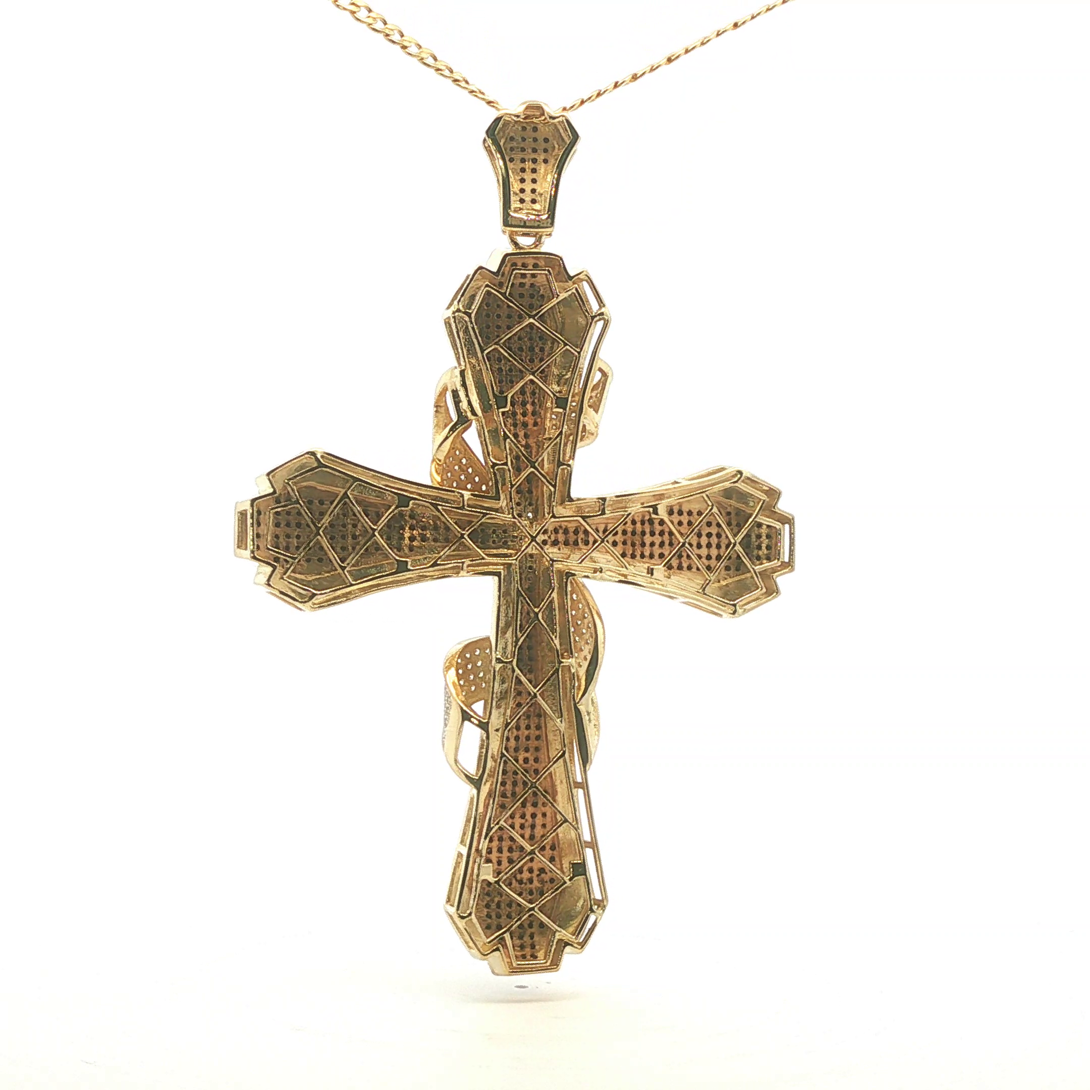 Dije de cruz en oro 10k con zirconia negra