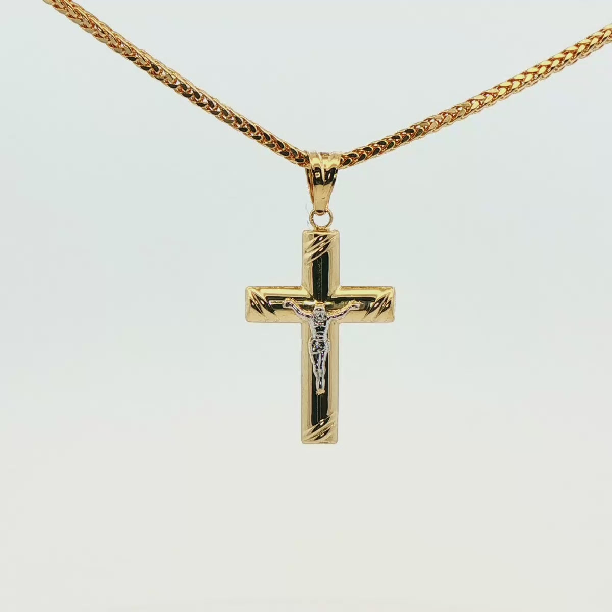 DIJE DE CRUZ EN ORO 14K CON FIGURA EN ORO BLANCO