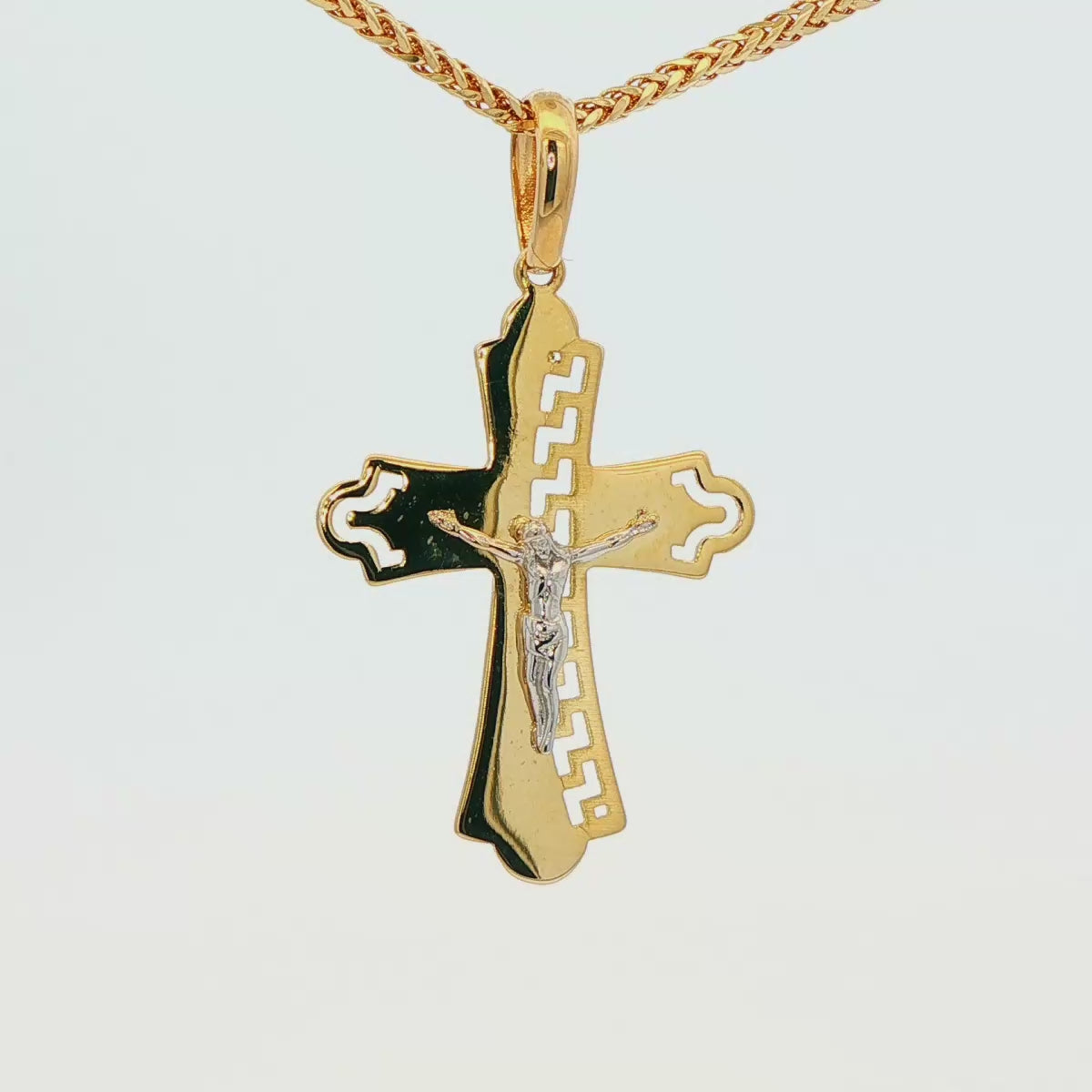 DIJE DE CRUZ EN ORO DE 14K CON FIGURA EN ORO BLANCO