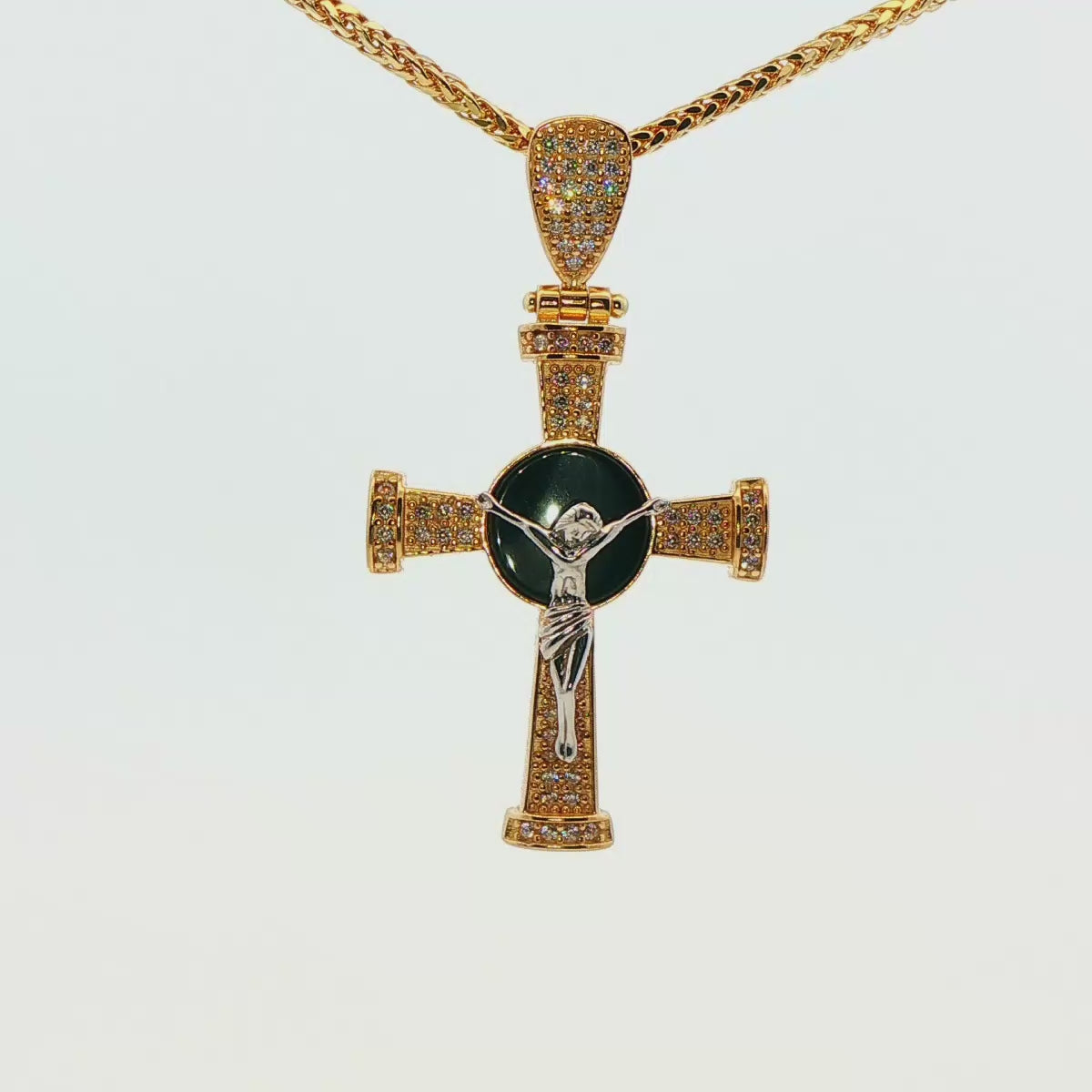 DIJE DE CRUZ EN ORO DE 14K CON FIGURA EN ORO BLANCO