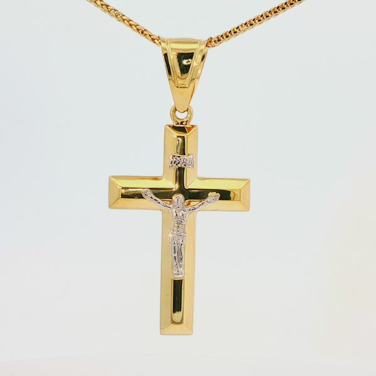 DIJE DE CRUZ EN ORO DE 14K CON FIGURA EN ORO BLANCO