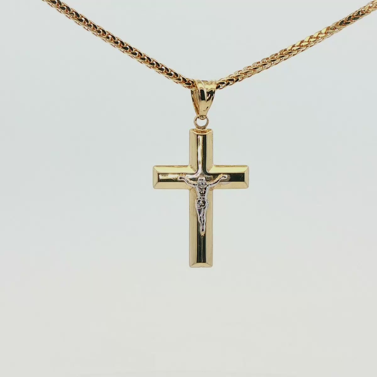 DIJE DE CRUZ EN ORO 14K CON FIGURA EN ORO BLANCO