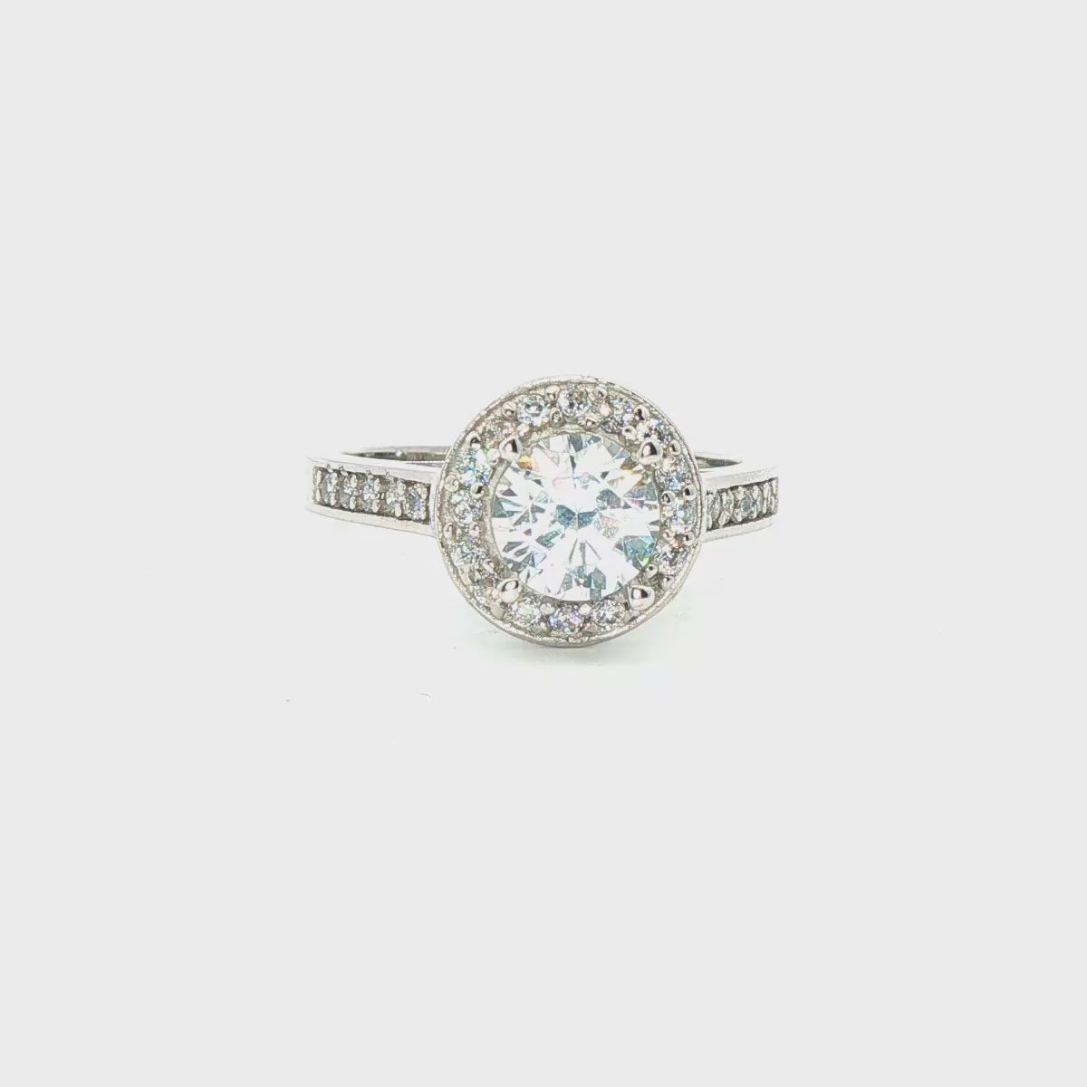 ANILLO SOLITARIO DE ORO BLANCO 14K CON ZIRCONIA CLÁSICA DE CRISTAL