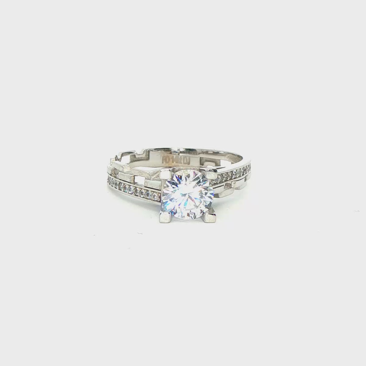 ANILLO DE ORO BLANCO 14K CON ZIRCONIA CENTRAL BRILLANTE