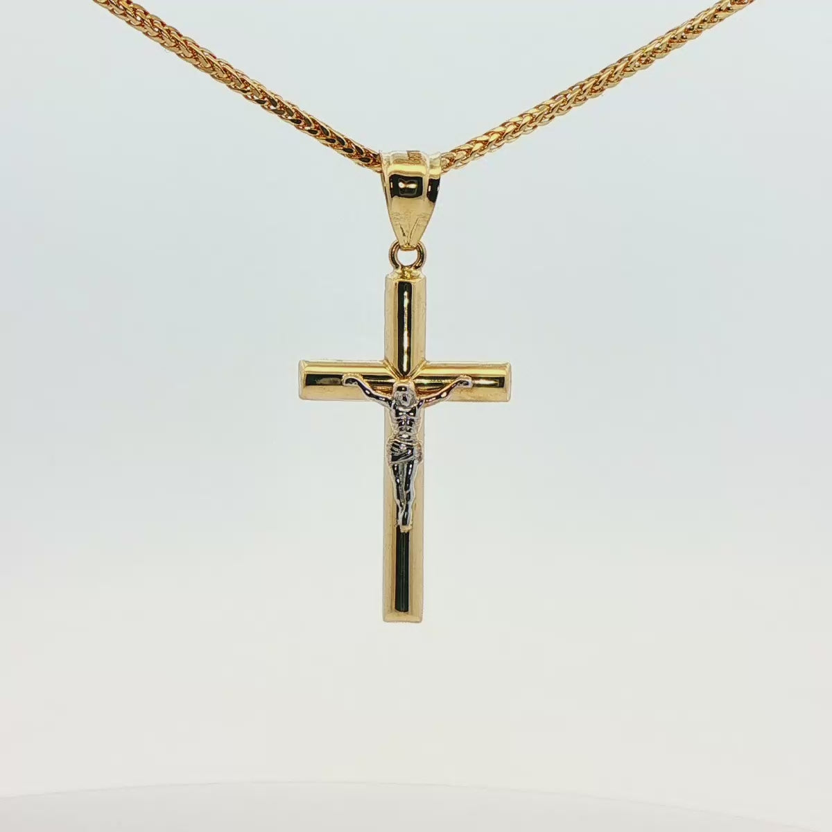 DIJE DE CRUZ EN ORO 14K CON FIGURA EN ORO BLANCO