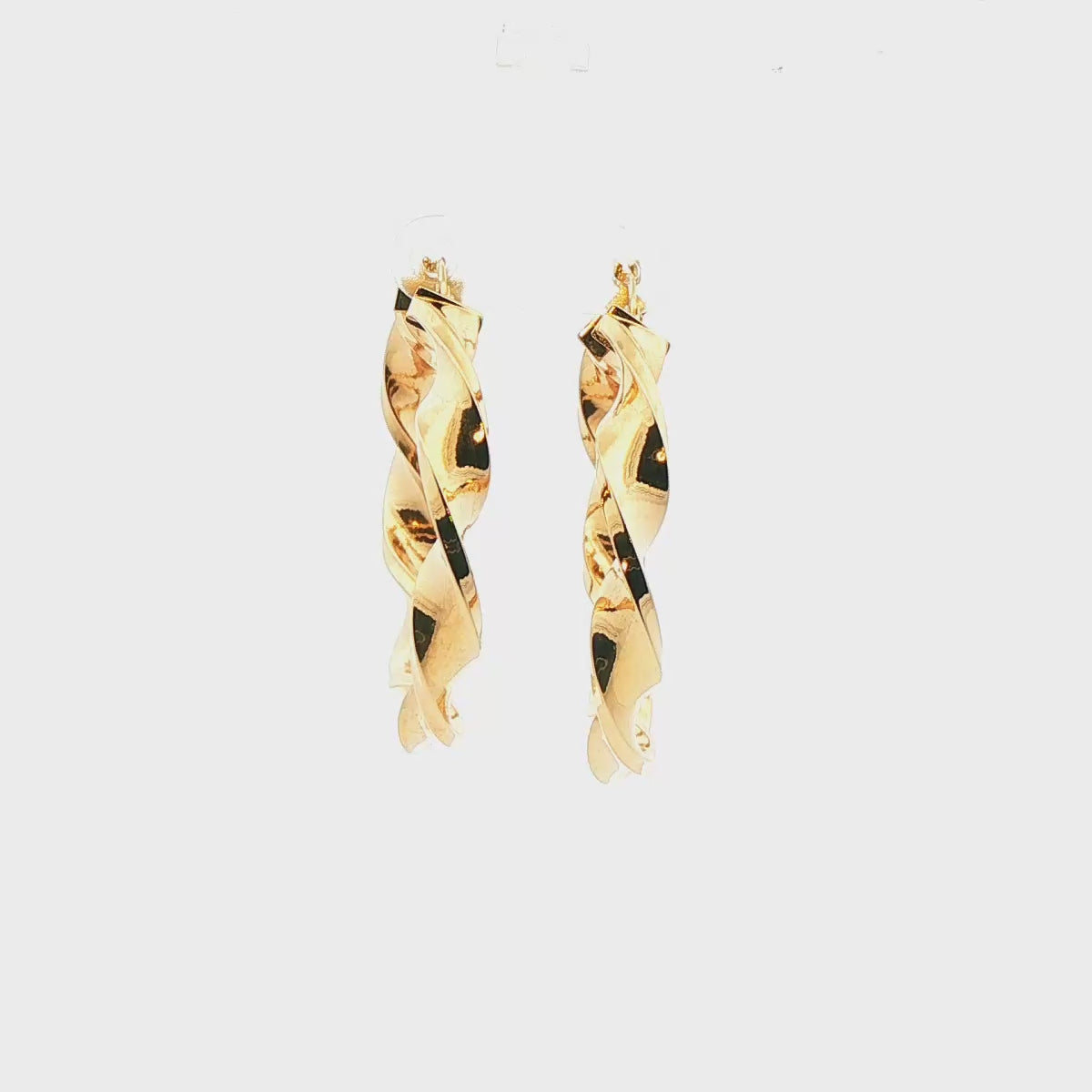 ARRACADAS CON DSEÑO TRENZADO EN ORO DE 14K