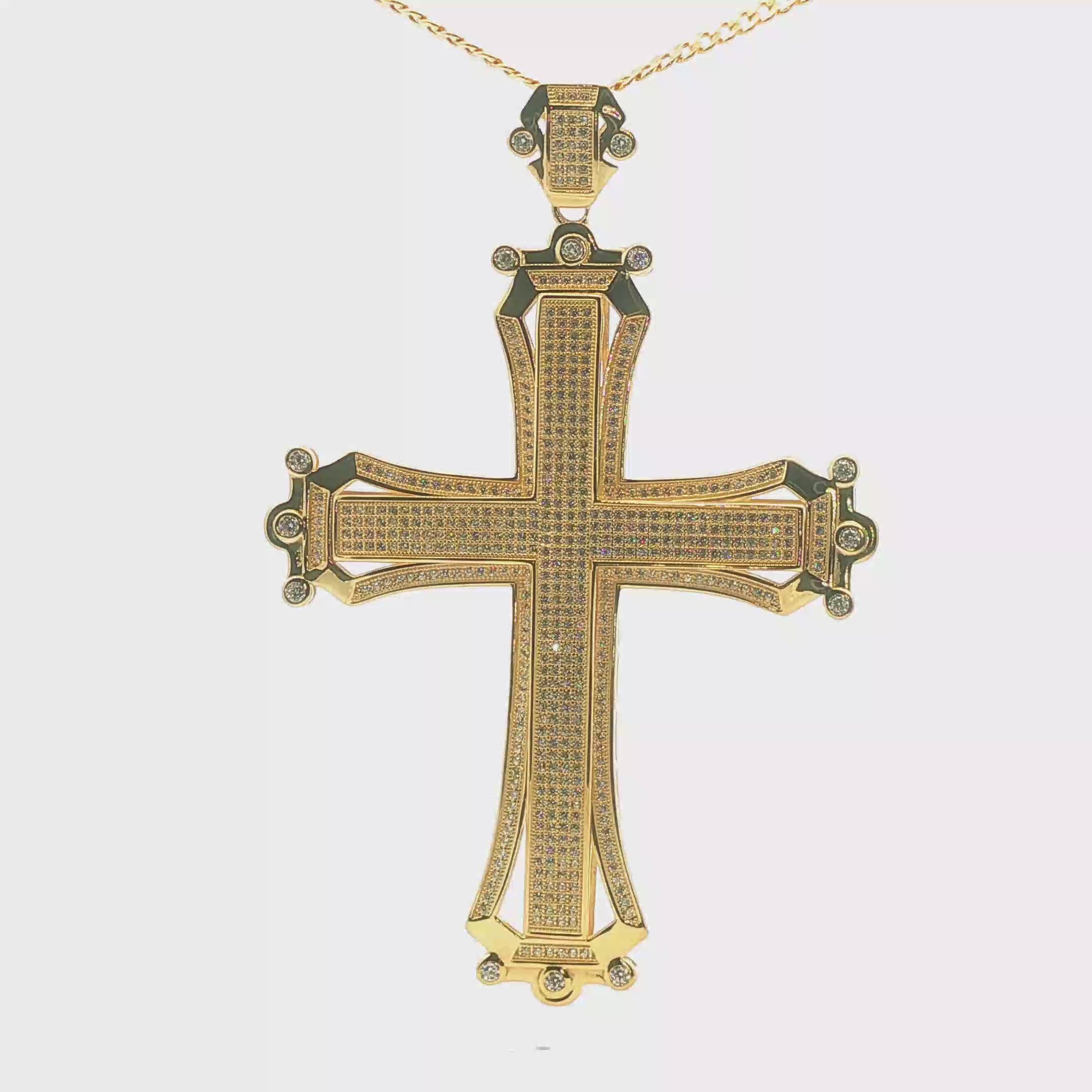 Cruz de Oro 10K con Zirconias