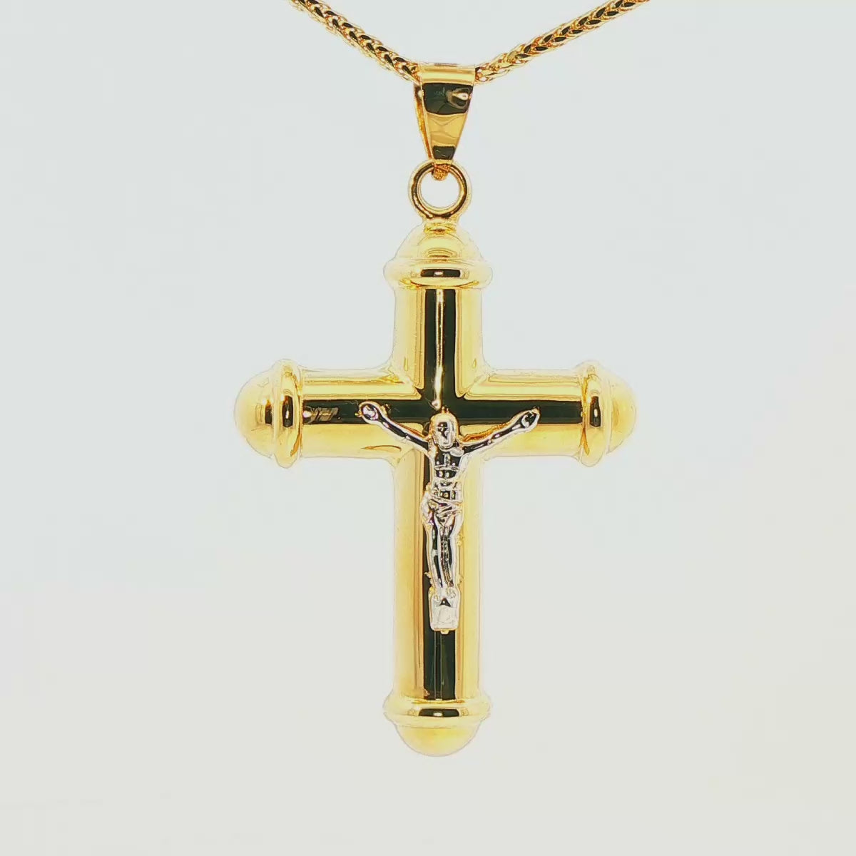 DIJE DE CRUZ EN ORO DE 14K CON FIGURA EN ORO BLANCO