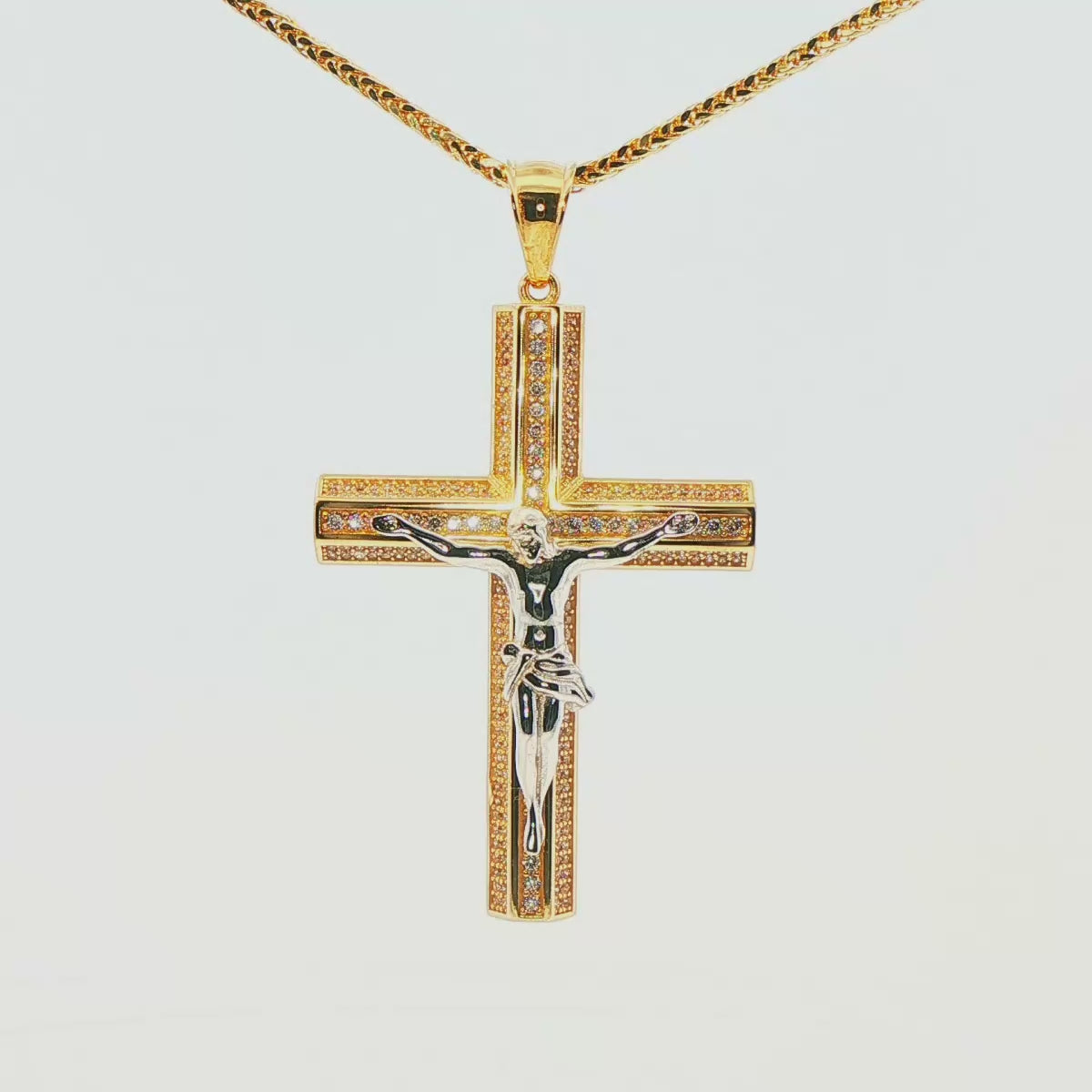 DIJE DE CRUZ EN ORO DE 14K CON FIGURA EN ORO BLANCO