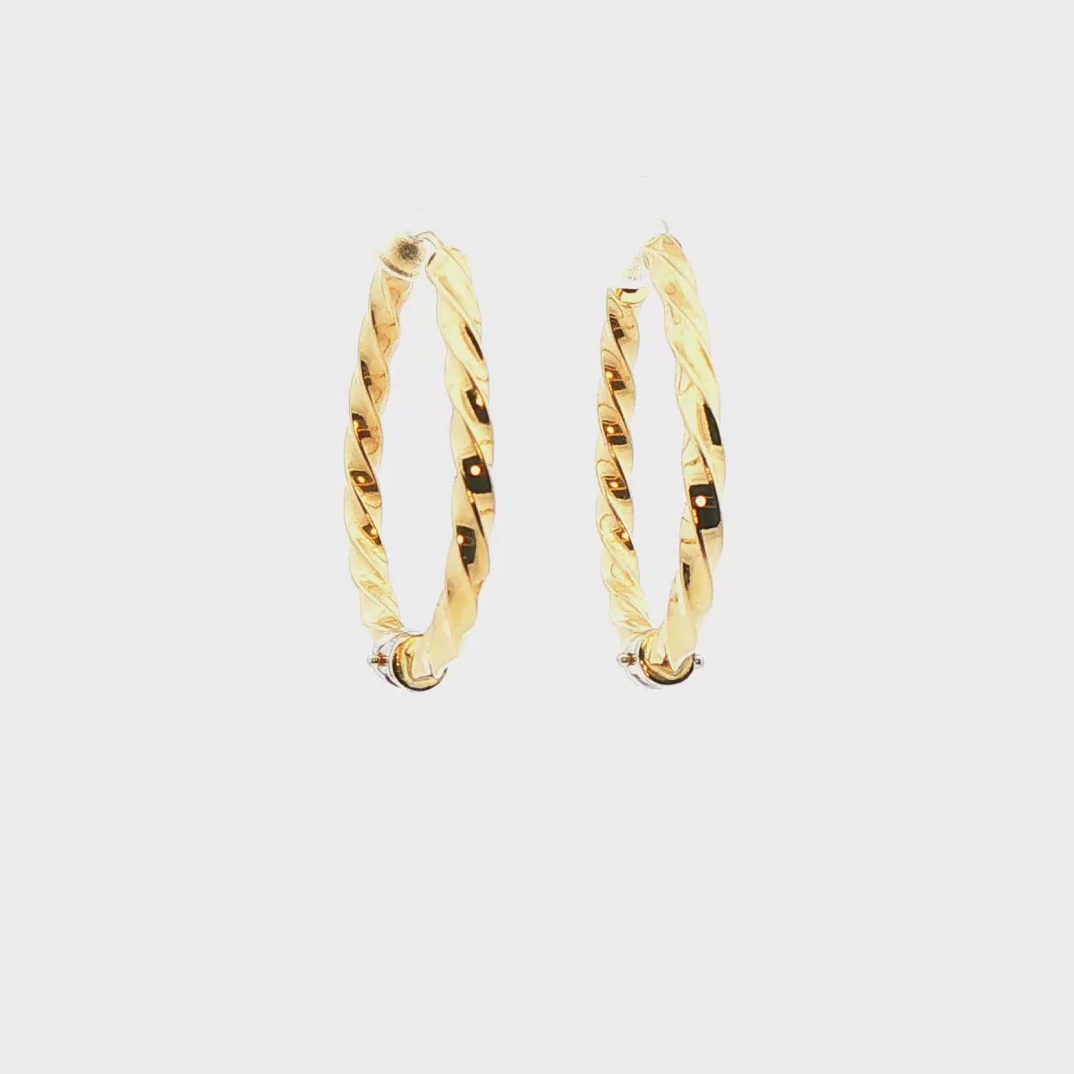 ARRACADAS CON DIASEÑO TRENZADO EN OR DE 14K