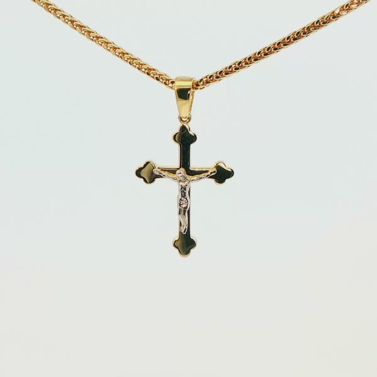 DIJE DE CRUZ EN ORO DE 14K CON FIGURA EN ORO BLANCO