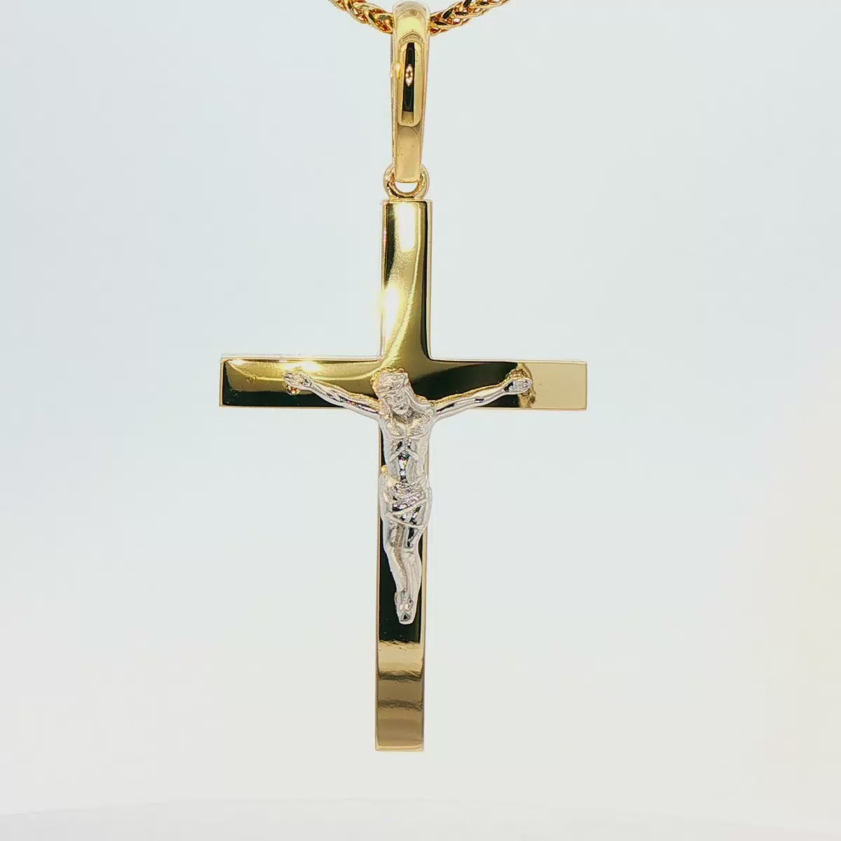 DIJE DE CRUZ EN ORO DE 14K CON FIGURA EN ORO BLANCO