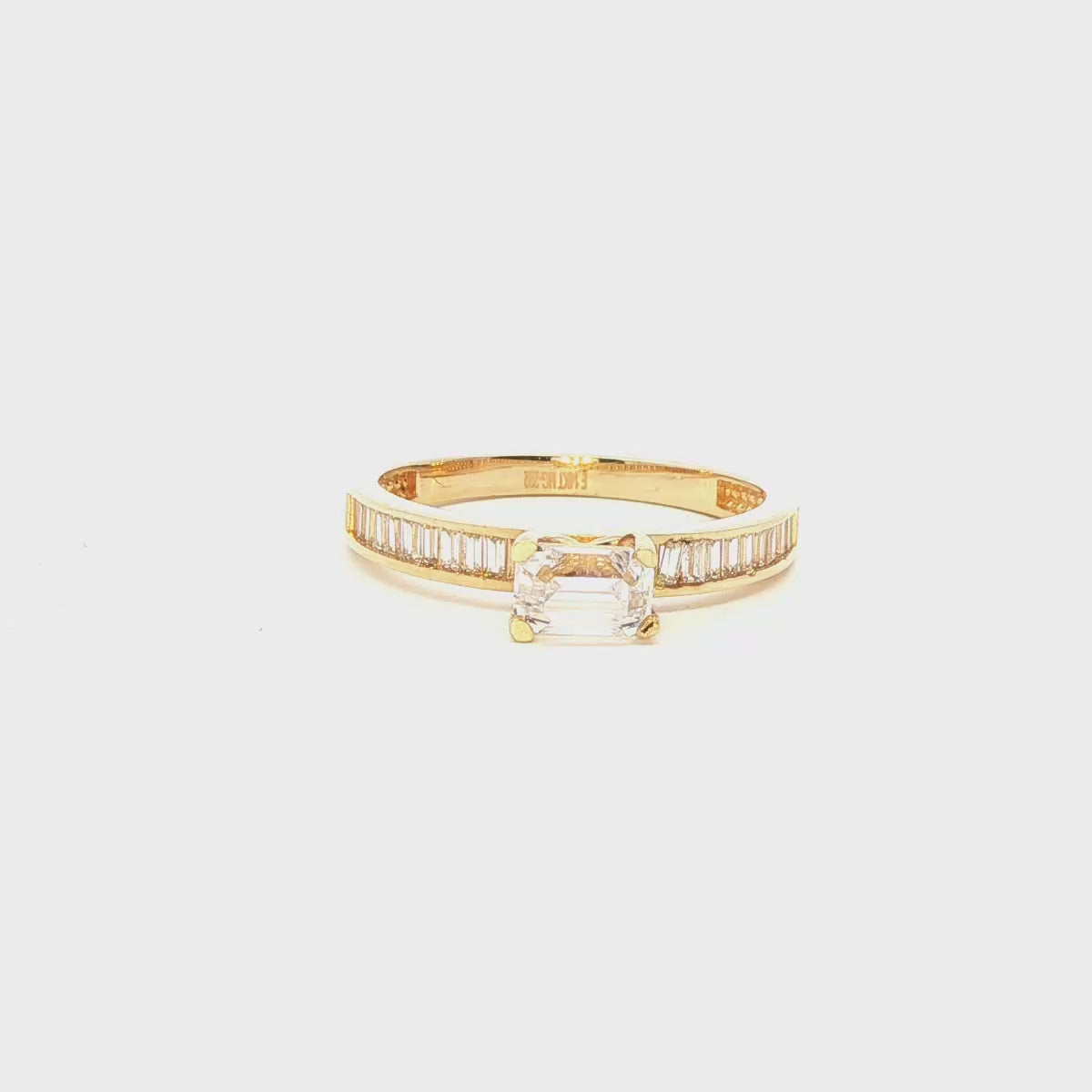 ANILLO EN ORO AMARILLO 14K CON ZIRCONIA BLANCA CENTRAL